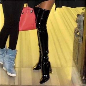 Patent leather above knee boots.